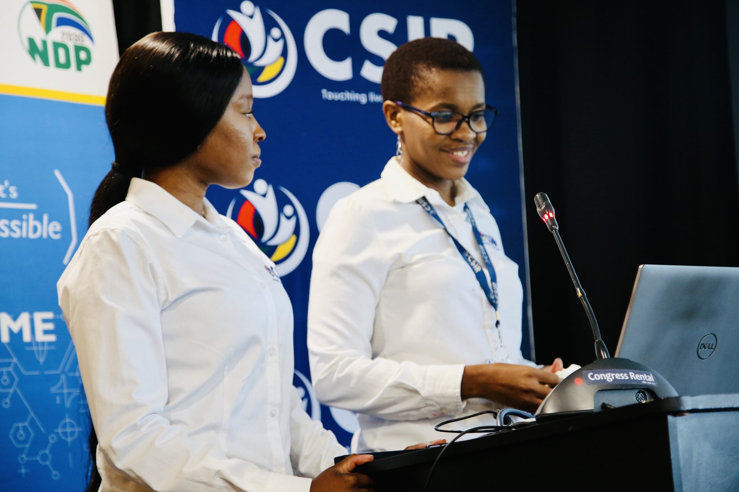 Dr. Nenekazi Mkuzangwe and Ms Thuli Mkhwanazi presenting early findings of a study on the current cybersecurity landscape.